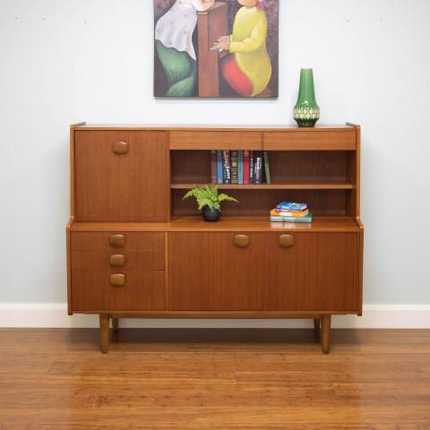 Beautiful timber knobs make this piece pop!