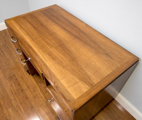 This 1940's desk - its design taken to another level with the use of a mix of solid walnut timber along with decorative walnut timber veneer.