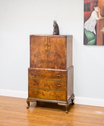 Burl walnut timber veneer is showcased in this 1920's cocktail cabinet. The wood grain figuring is just stunning.