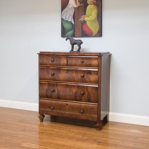 The flowing curves in this mid 1800's Biedermeier chest of drawers, showcasing exquisite flame mahogany timber veneer warms the cockles of my heart!