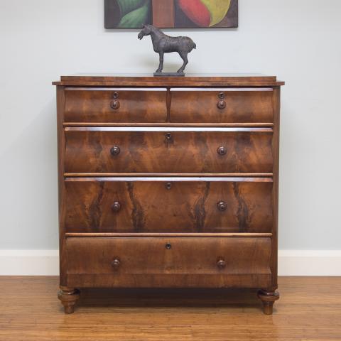 The flowing curves in this mid 1800's Biedermeier chest of drawers, showcasing exquisite flame mahogany timber veneer warms the cockles of my heart!