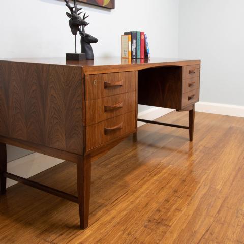 Striking use of solid timber and timber veneer Brazilian Rosewood in this 1960's Danish made desk.